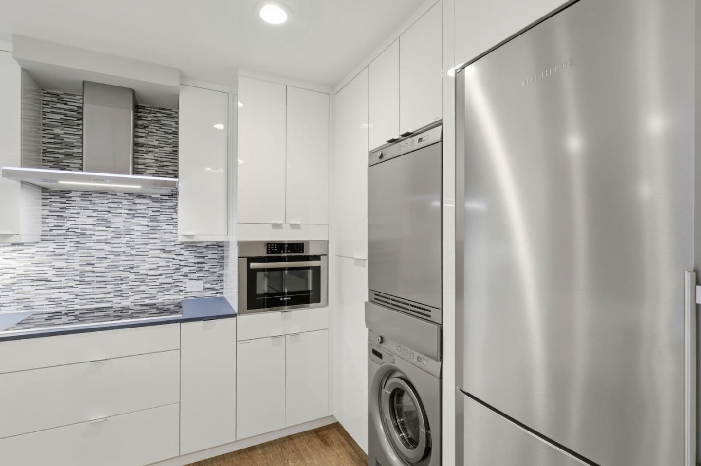 152 Castillion Terrace Santa Cruz, CA 95060 - Photo 10 of 37 a kitchen with cabinets and stainless steel appliances