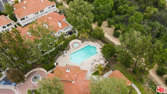 a view of outdoor space and swimming pool
