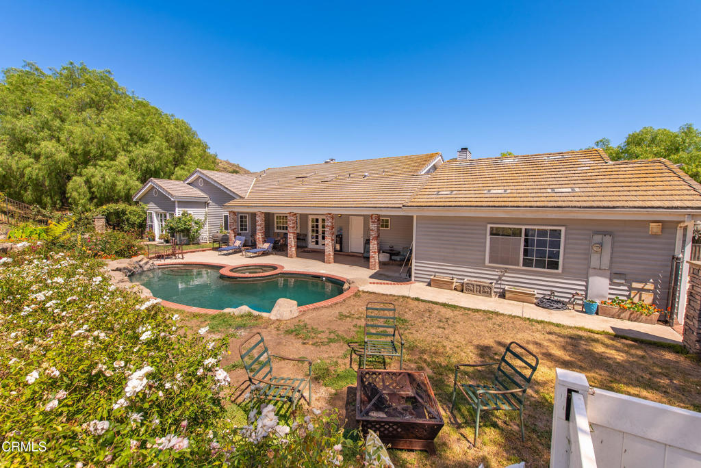 4850 North Moorpark Road Thousand Oaks, CA 93021 - Photo 11 of 54 a view of a house with swimming pool and sitting area