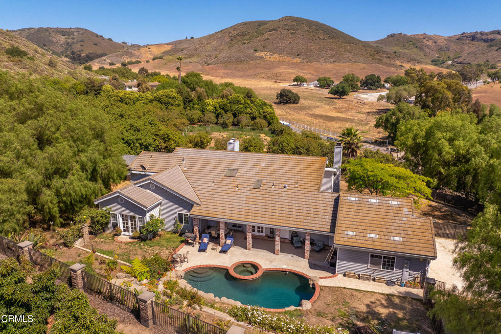 4850 North Moorpark Road Thousand Oaks, CA 93021 - Photo 3 of 54 an aerial view of a house with a mountain