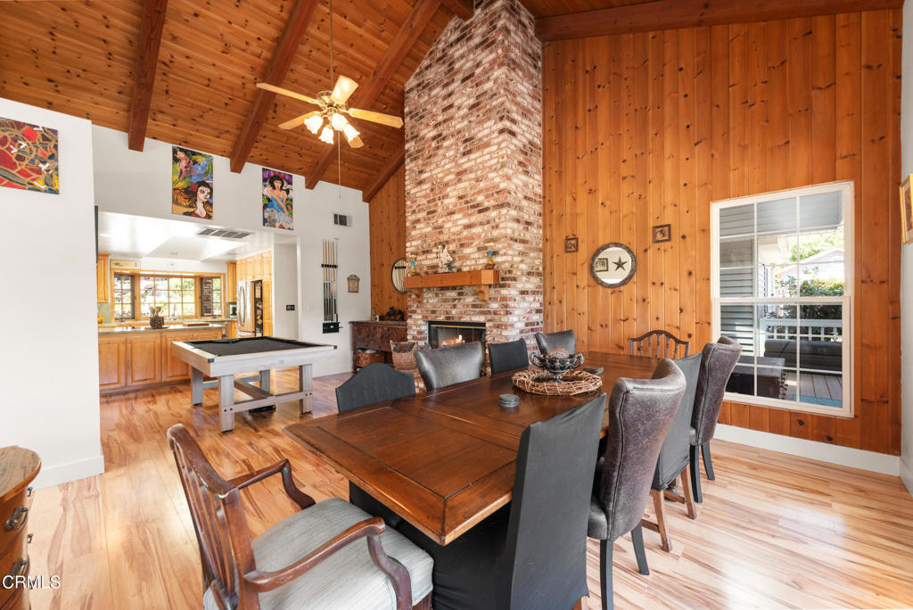 4850 North Moorpark Road Thousand Oaks, CA 93021 - Photo 33 of 54 a view of a dining room with furniture window and wooden floor