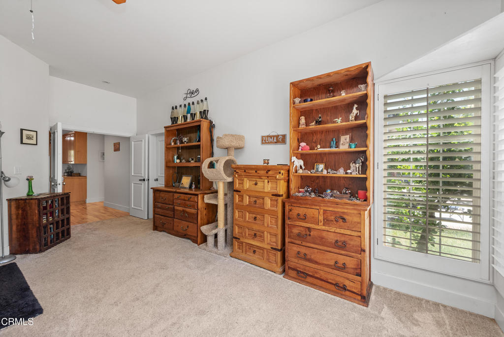 4850 North Moorpark Road Thousand Oaks, CA 93021 - Photo 35 of 54 a view of a bedroom with furniture and closet
