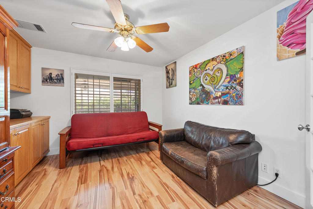 4850 North Moorpark Road Thousand Oaks, CA 93021 - Photo 37 of 54 a living room with furniture and a window