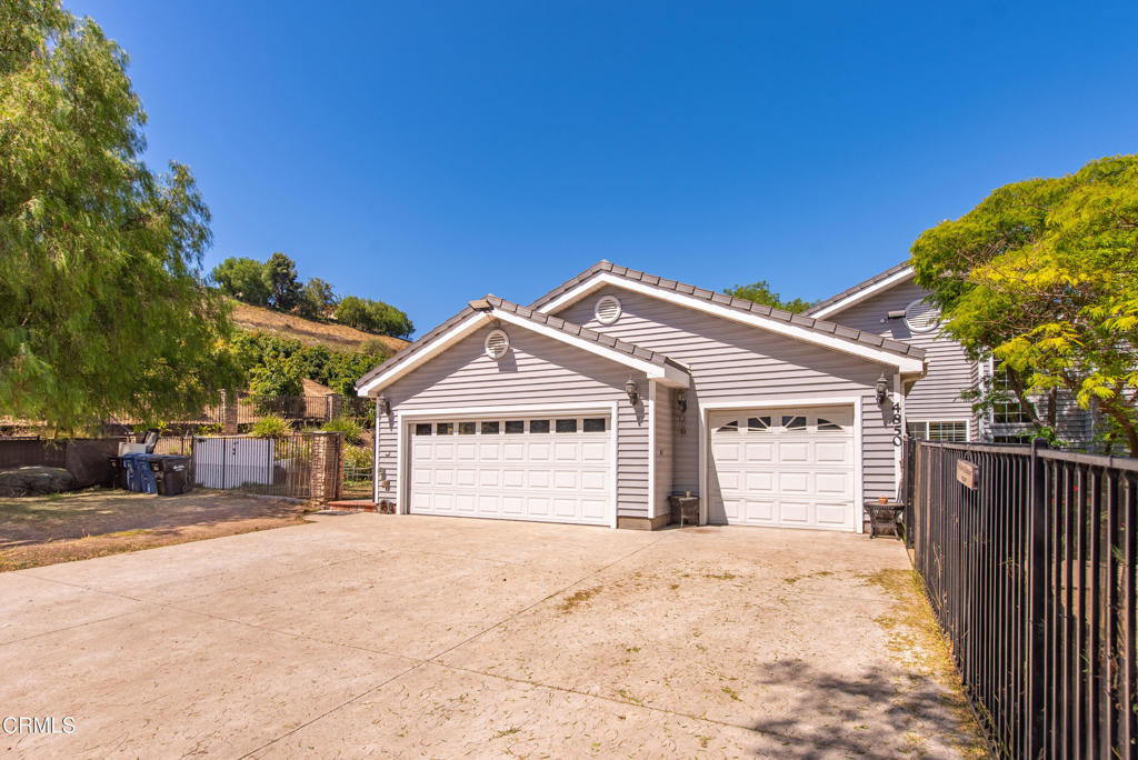 4850 North Moorpark Road Thousand Oaks, CA 93021 - Photo 45 of 54 a front view of a house with a outdoor space