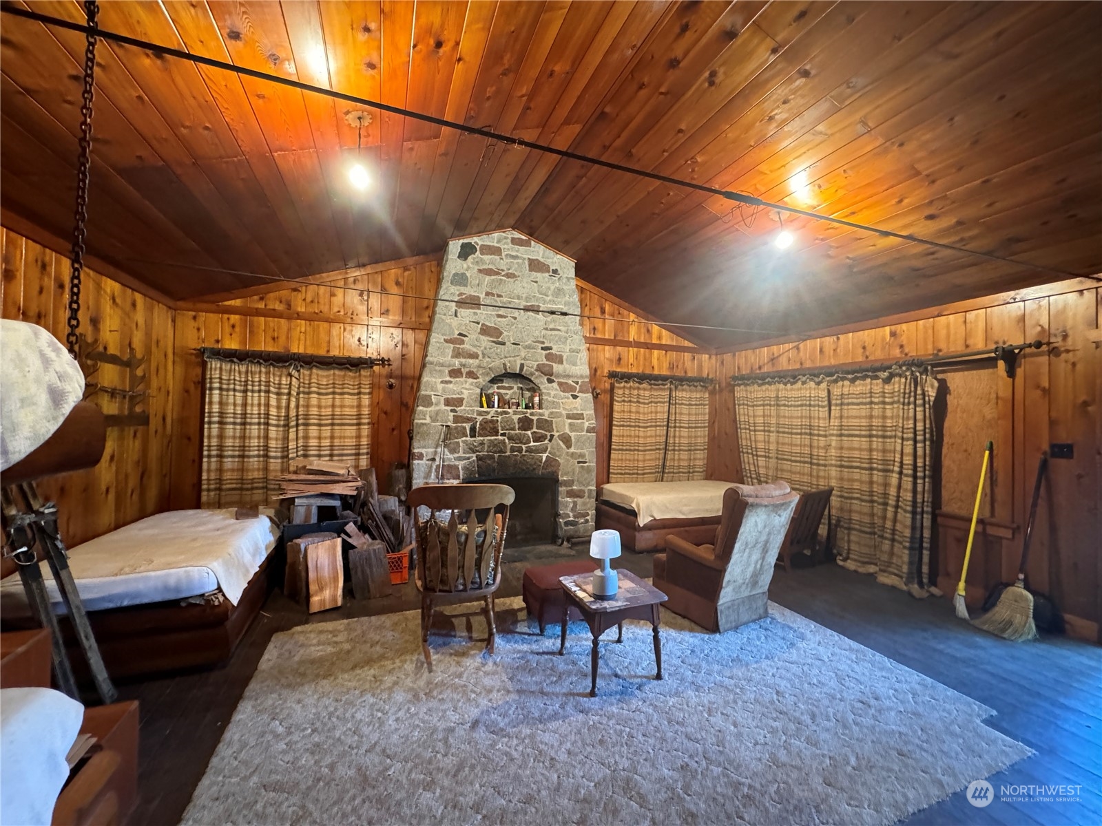 4061 Fs Road Easton, WA 98925 - Photo 11 of 26 a living room with furniture and a floor to ceiling window