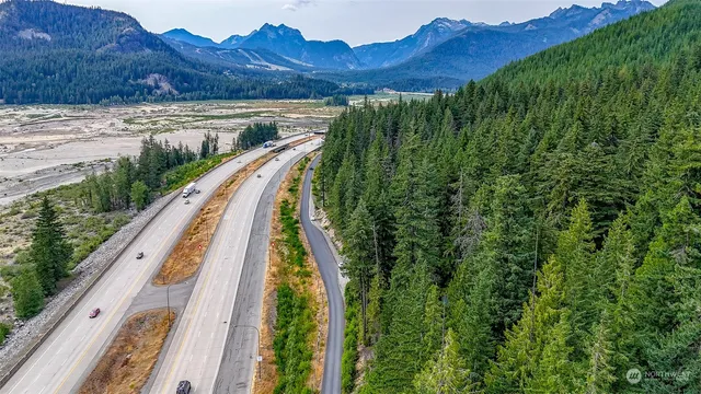 a view of a pathway both side of yard