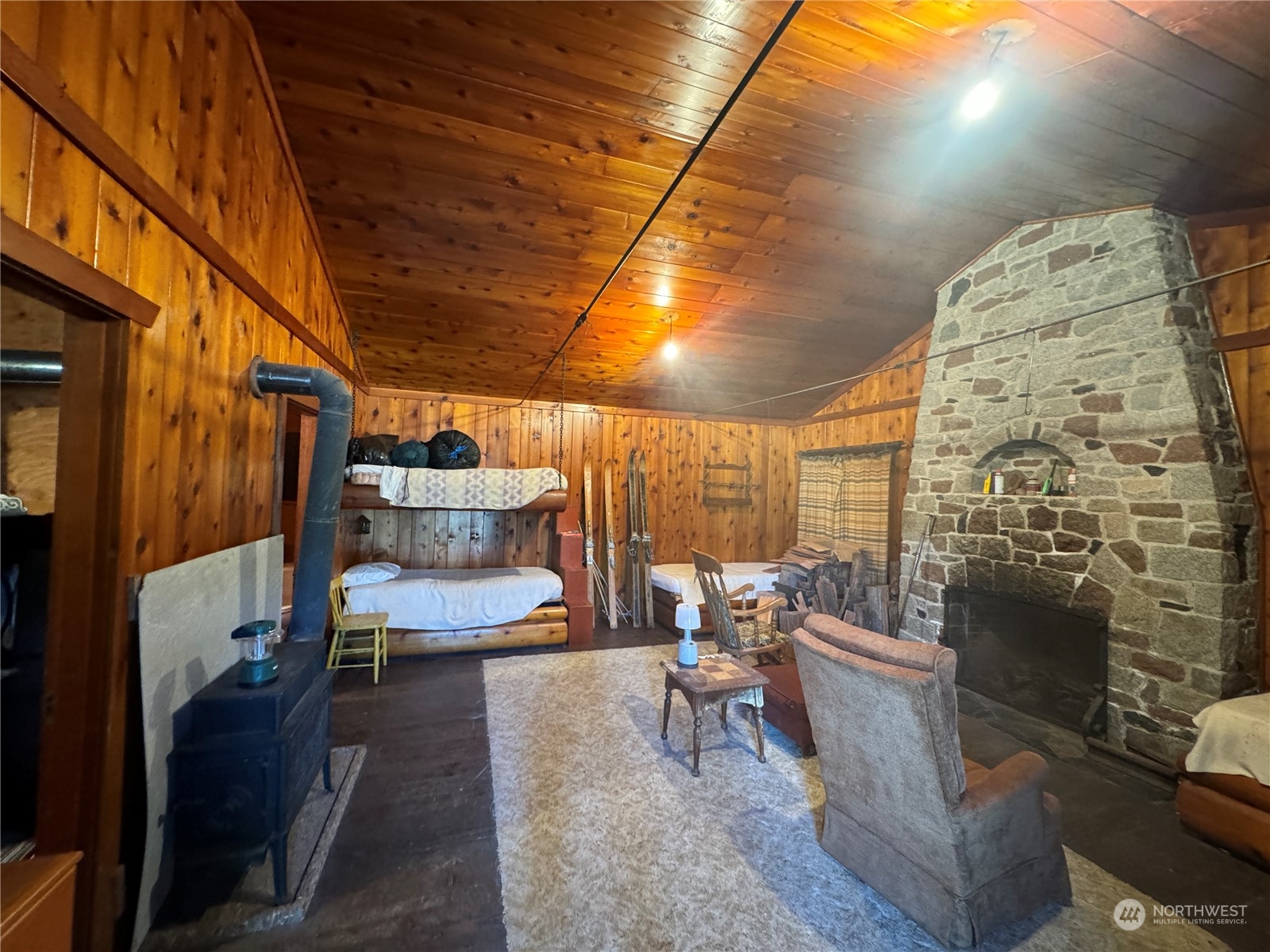 4061 Fs Road Easton, WA 98925 - Photo 10 of 26 a living room with couches and a fireplace