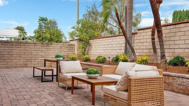 a view of deck with a table and chairs