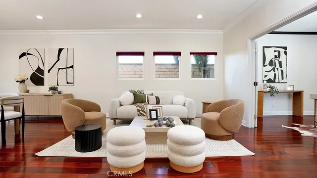a living room with furniture lamp and rug