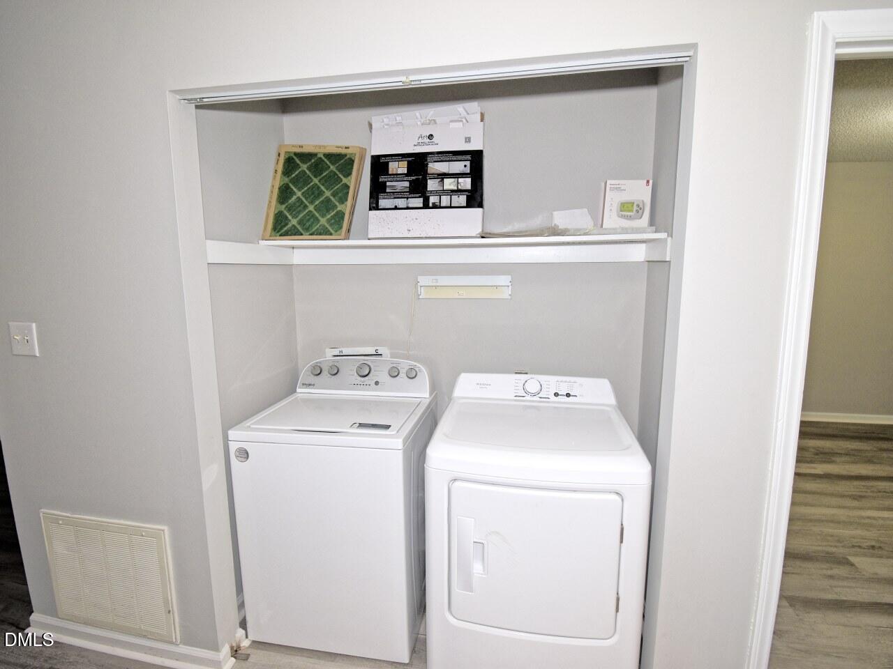 841 Barringer Drive, Unit A Raleigh, NC 27606 - Photo 18 of 23 a utility room with dryer and washer