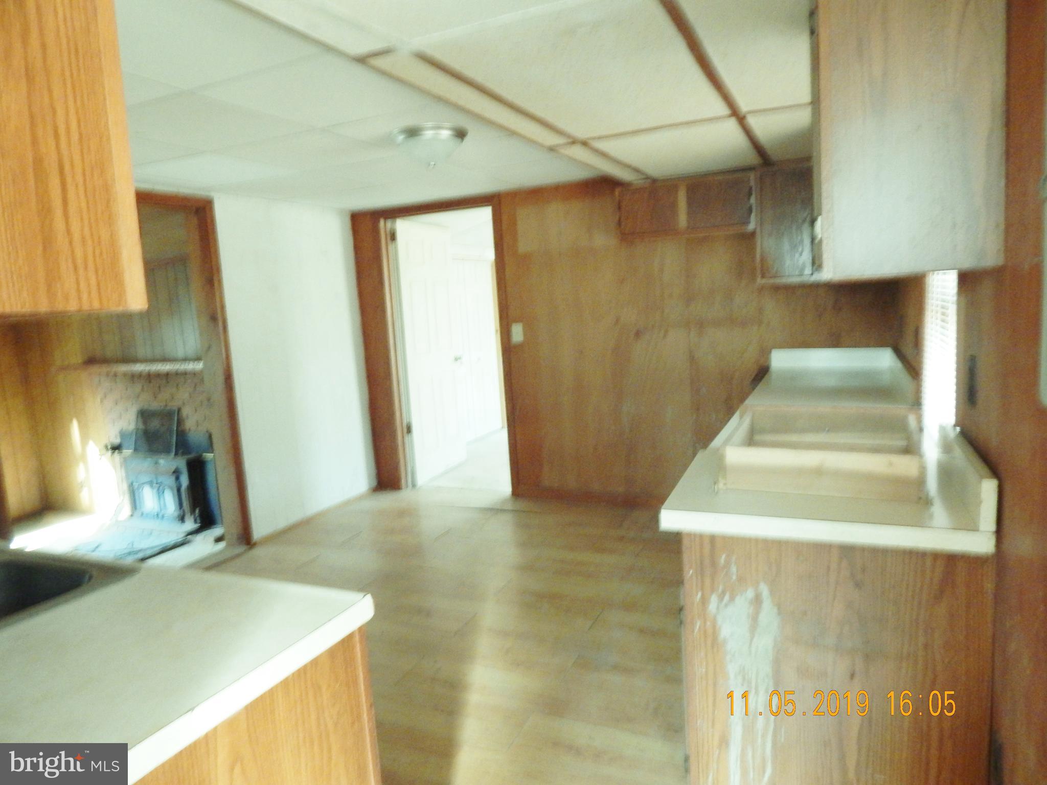 4040 Wv Route Berkeley Springs, WV 25411 - Photo 3 of 28 Side entrance to kitchen.