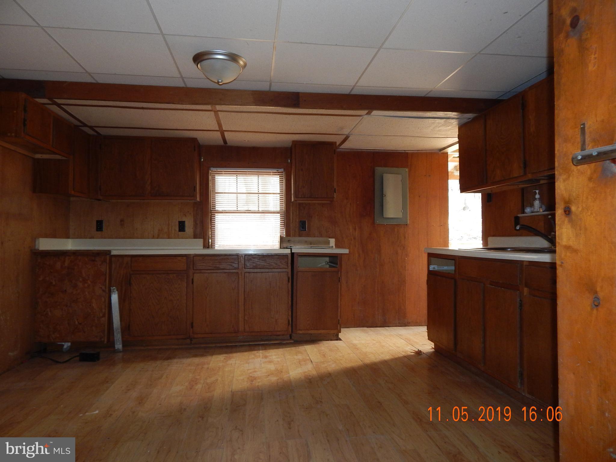 4040 Wv Route Berkeley Springs, WV 25411 - Photo 7 of 28 Lots of cabinets for storage.