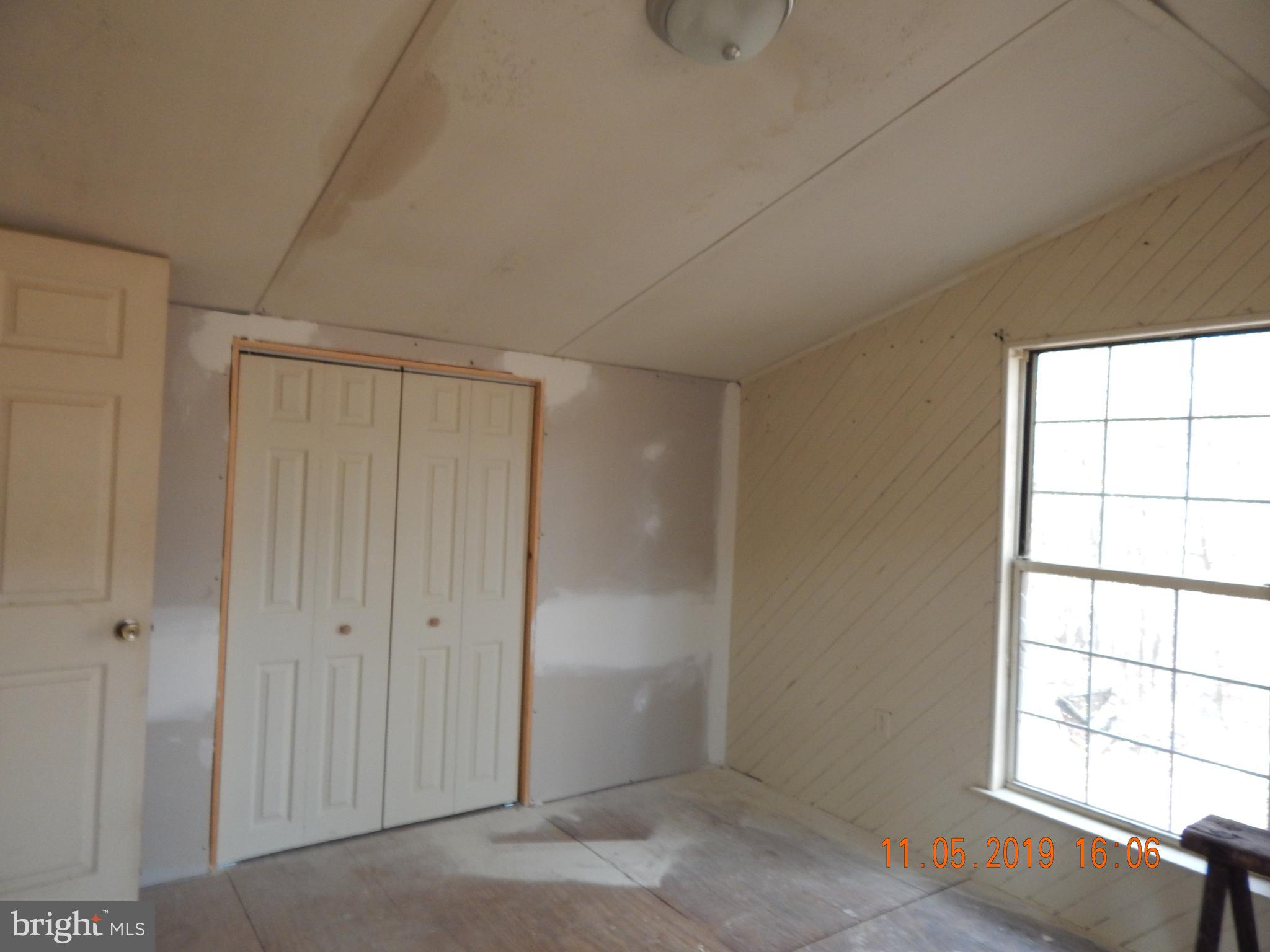 4040 Wv Route Berkeley Springs, WV 25411 - Photo 9 of 28 Bedroom #1 with closet.