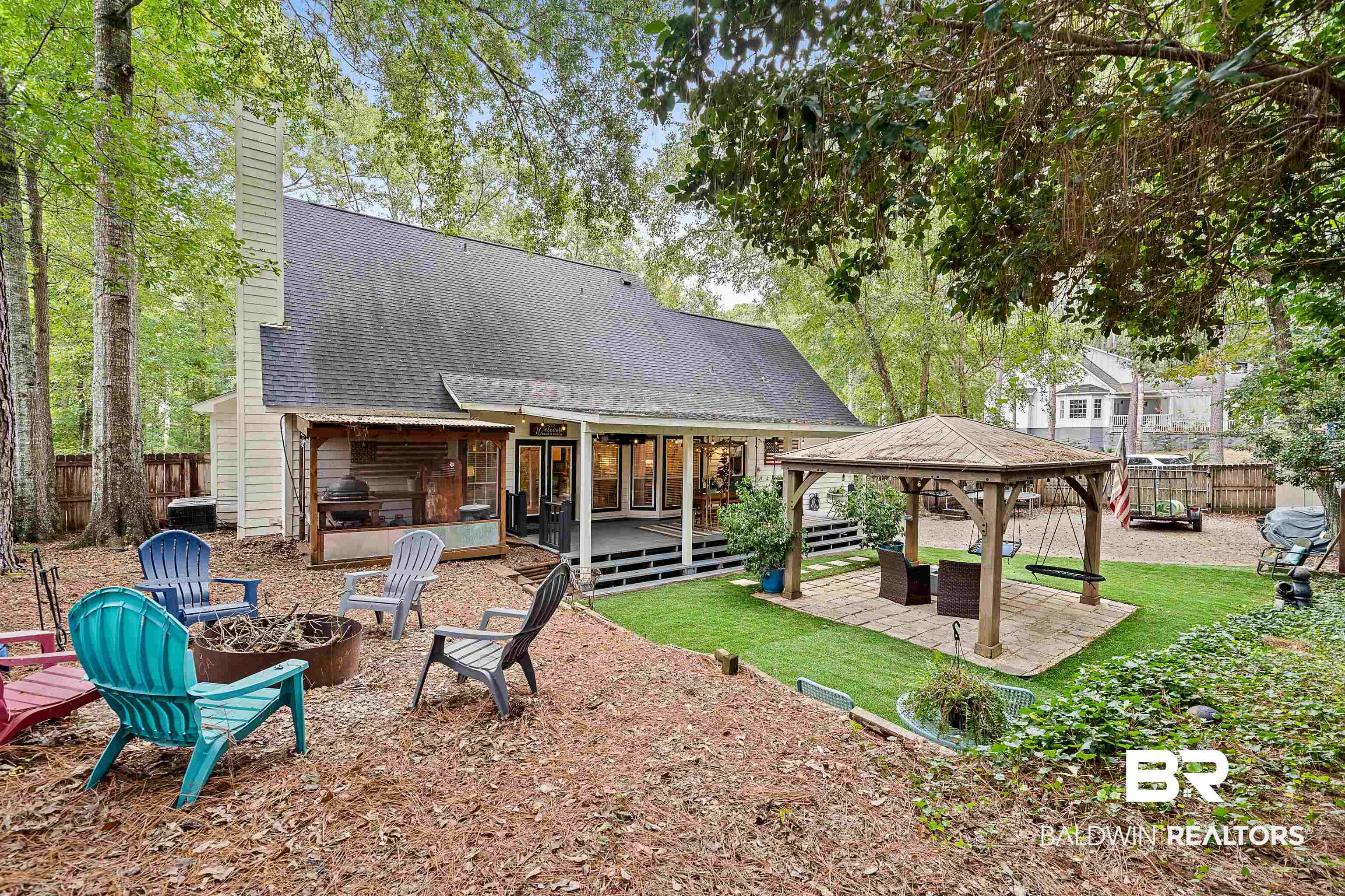 619 Ridgewood Drive Daphne, AL 36526 - Photo 40 of 47 Back of house with a patio, an outdoor fire pit ,and gazebo,