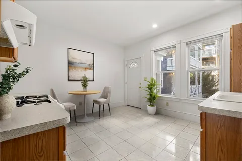 a view of a livingroom with furniture and front door