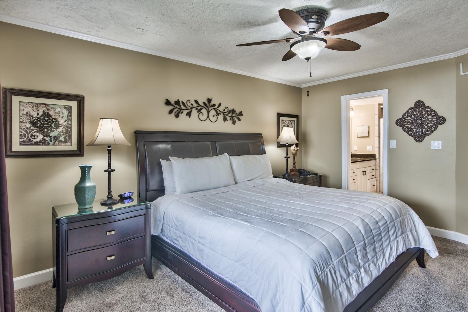 500 Gulf Shore Drive, Unit 119B Destin, FL 32541 - Photo 13 of 35 a bedroom with a large bed and a chandelier