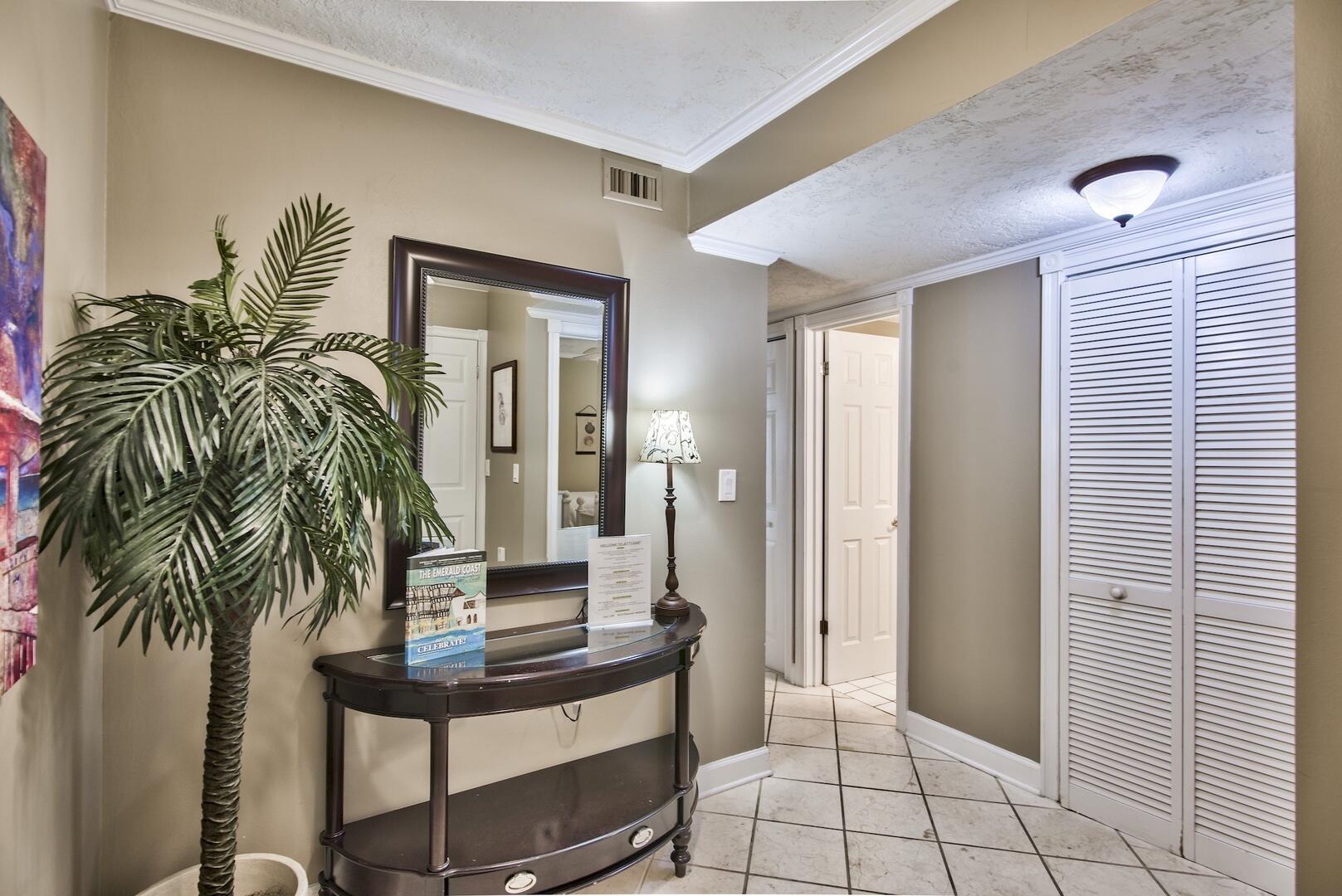 500 Gulf Shore Drive, Unit 119B Destin, FL 32541 - Photo 18 of 35 a view of a hallway with potted plants