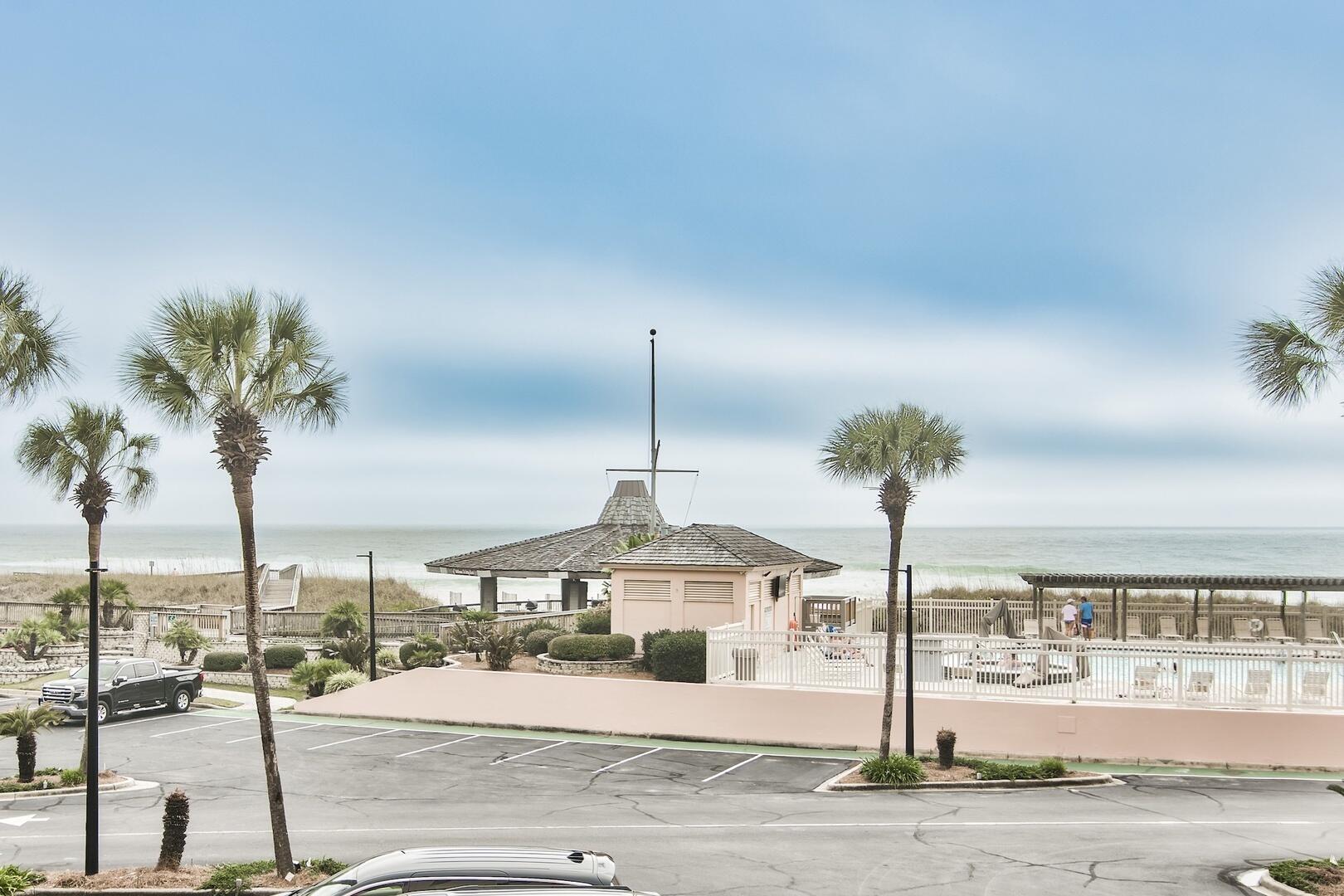 500 Gulf Shore Drive, Unit 119B Destin, FL 32541 - Photo 4 of 35 a front view of a building with parking space