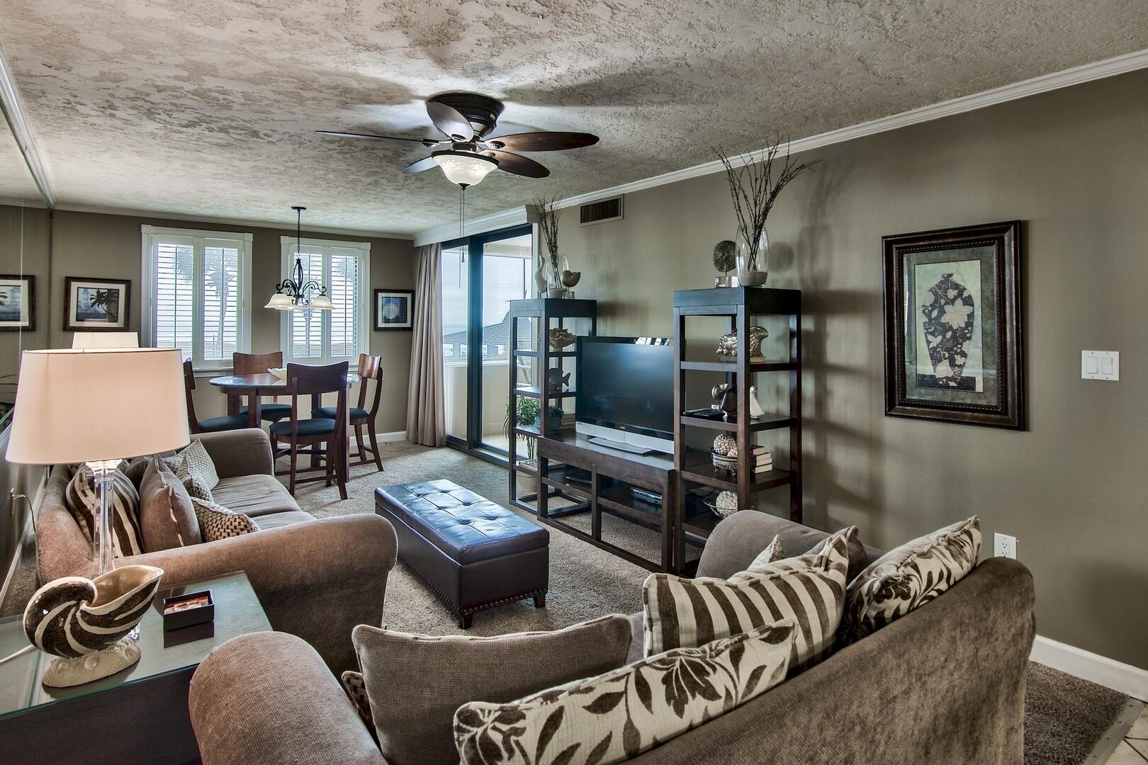 500 Gulf Shore Drive, Unit 119B Destin, FL 32541 - Photo 6 of 35 a living room with furniture and a flat screen tv