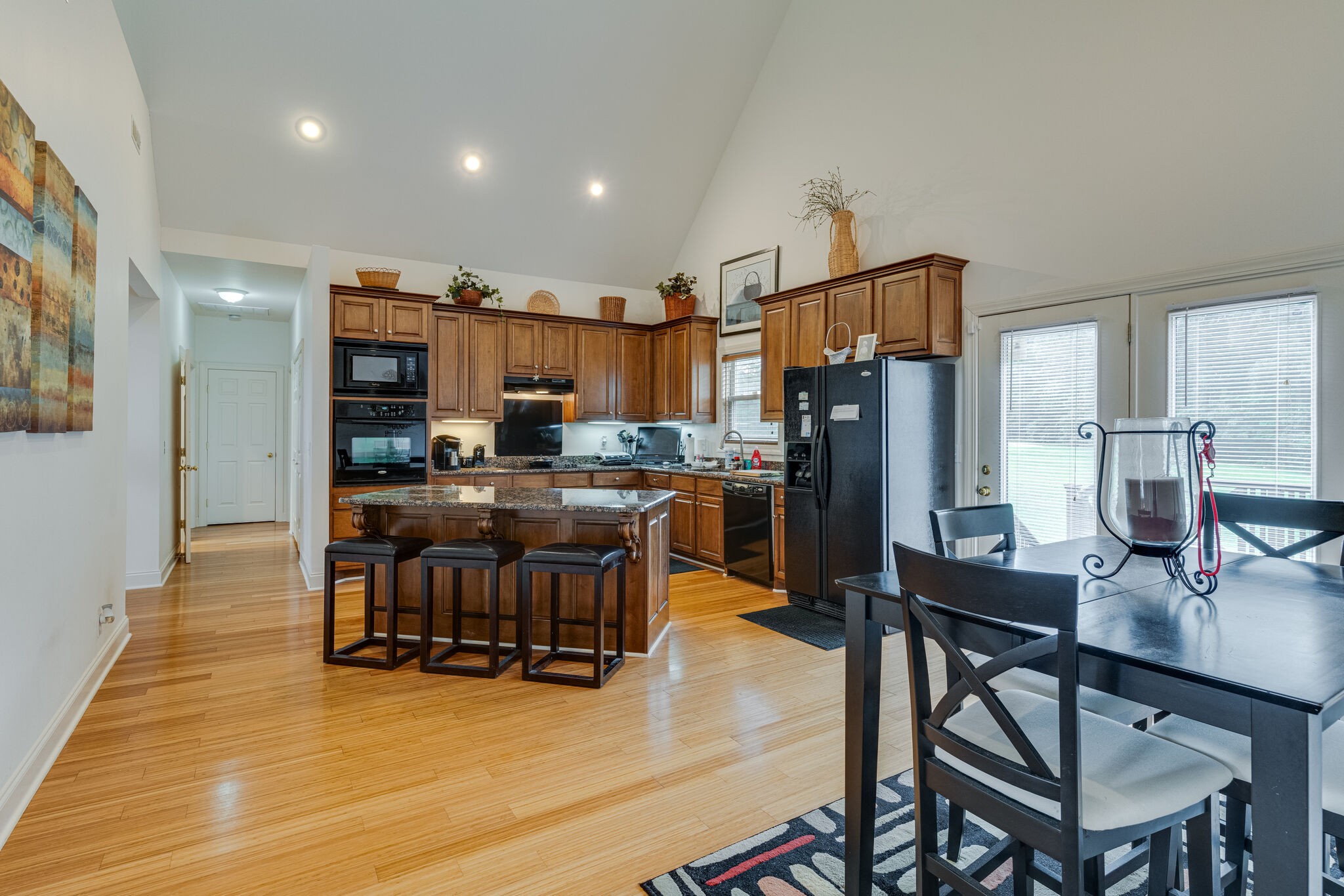 4664 New Cut Road Greenbrier, TN 37073 - Photo 6 of 87 a view of a dining room with furniture and wooden floor