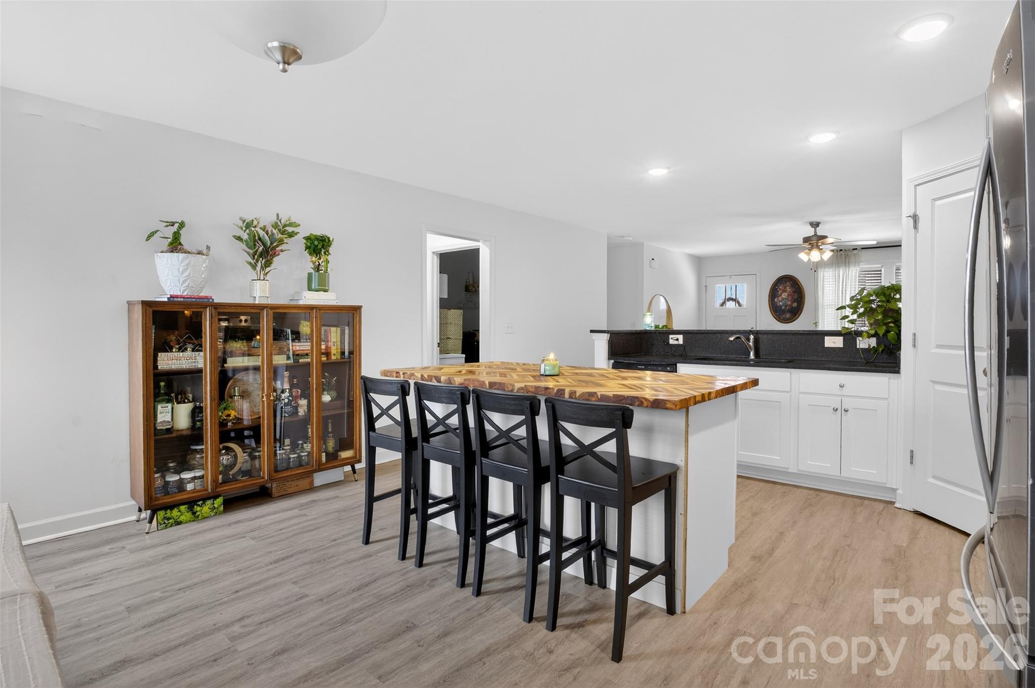 1526 Shepard Street Kannapolis, NC 28083 - Photo 14 of 40 a kitchen with a table and chairs in it