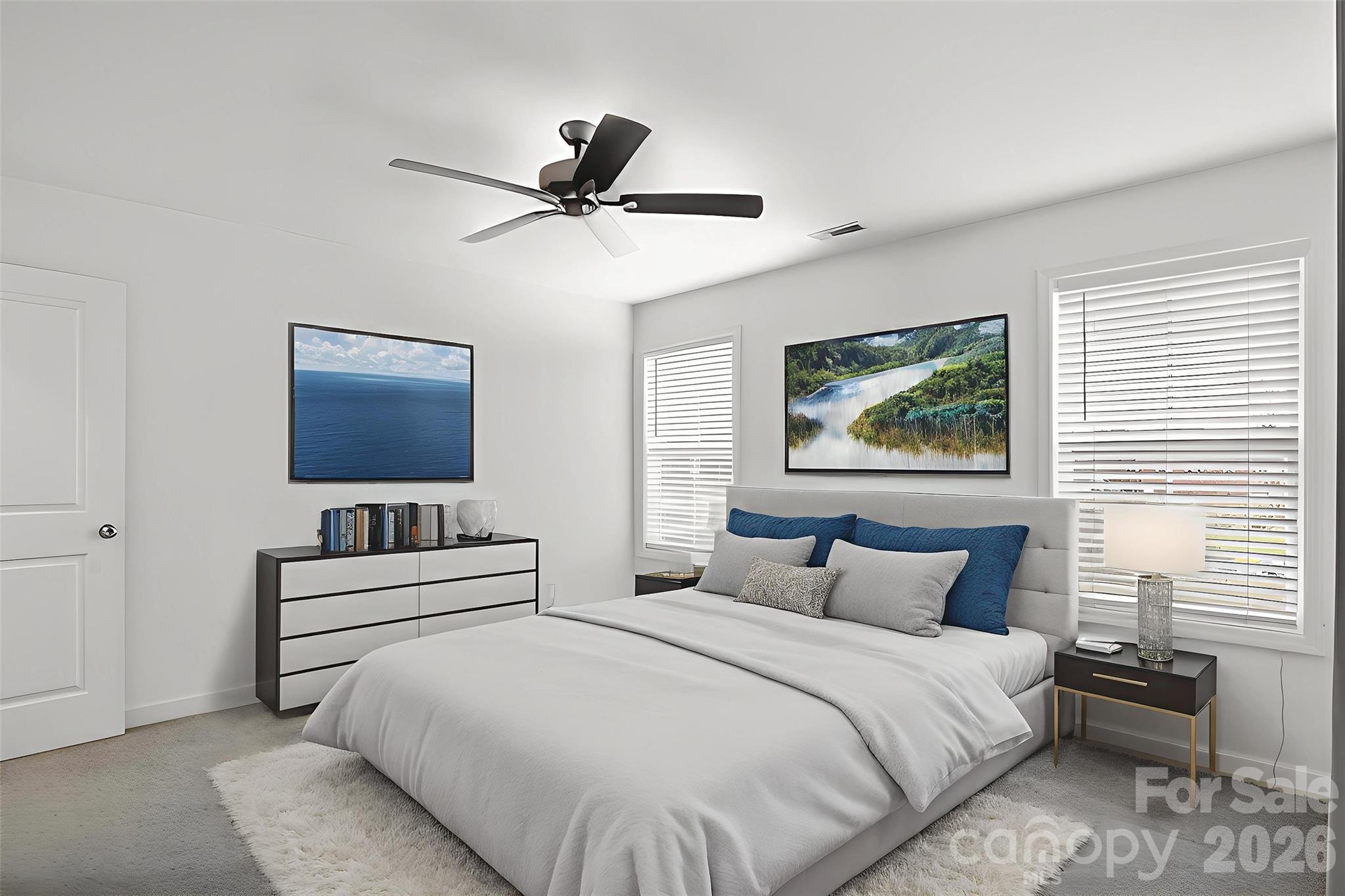 1526 Shepard Street Kannapolis, NC 28083 - Photo 16 of 40 a bedroom with a bed and a chandelier