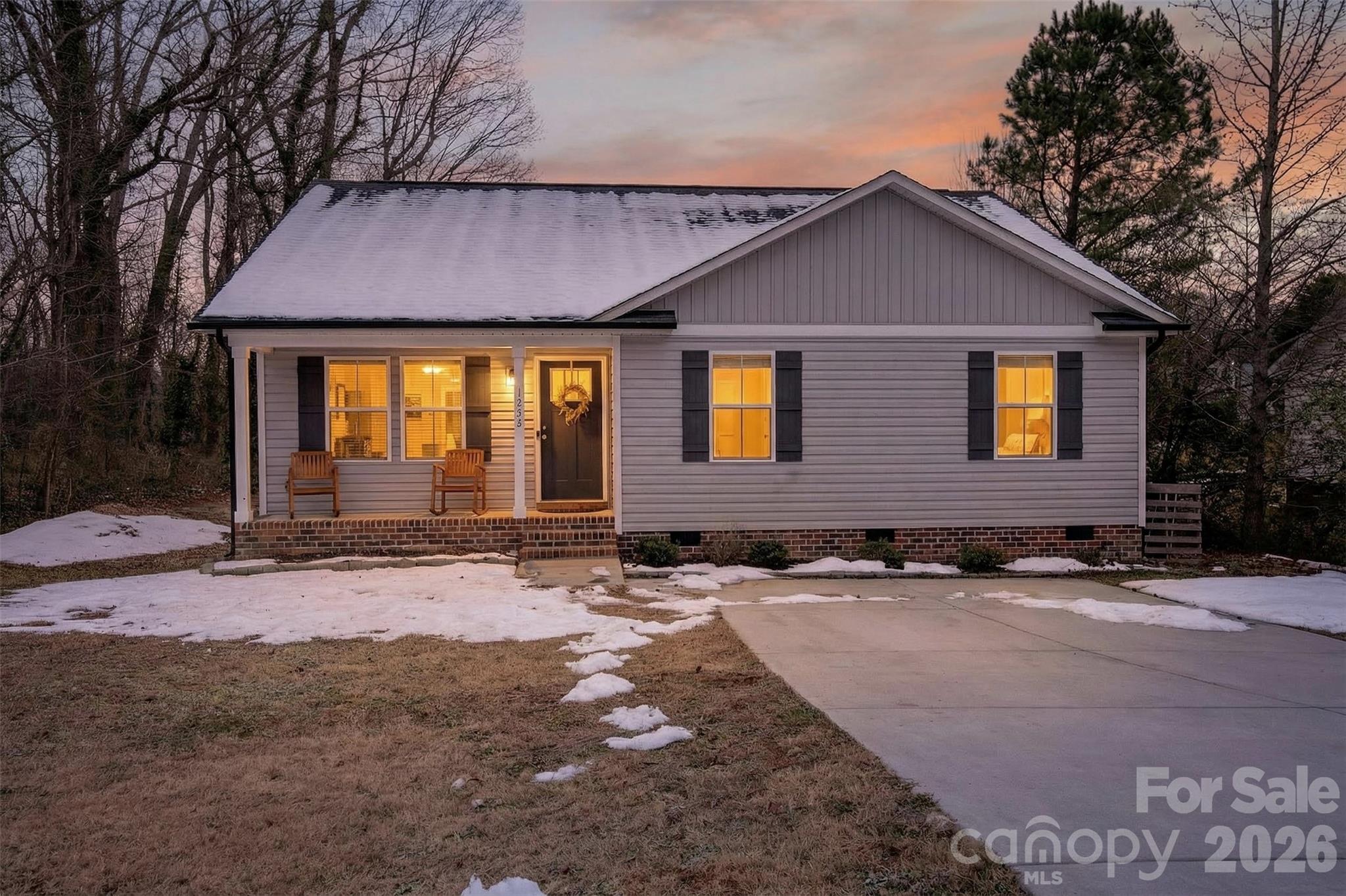 1526 Shepard Street Kannapolis, NC 28083 - Photo 2 of 40 a front view of a house with a yard