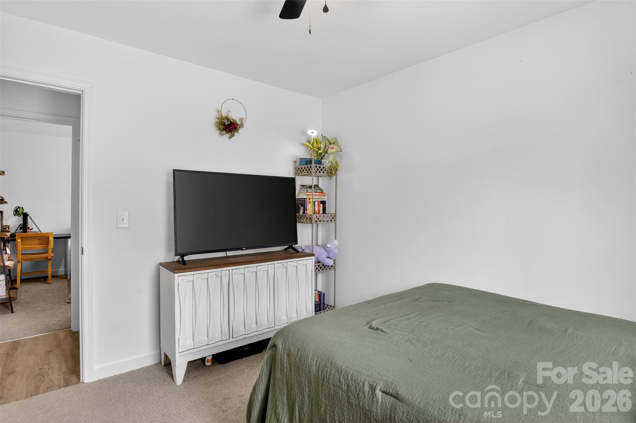 1526 Shepard Street Kannapolis, NC 28083 - Photo 30 of 40 a bedroom with a bed and a flat screen tv