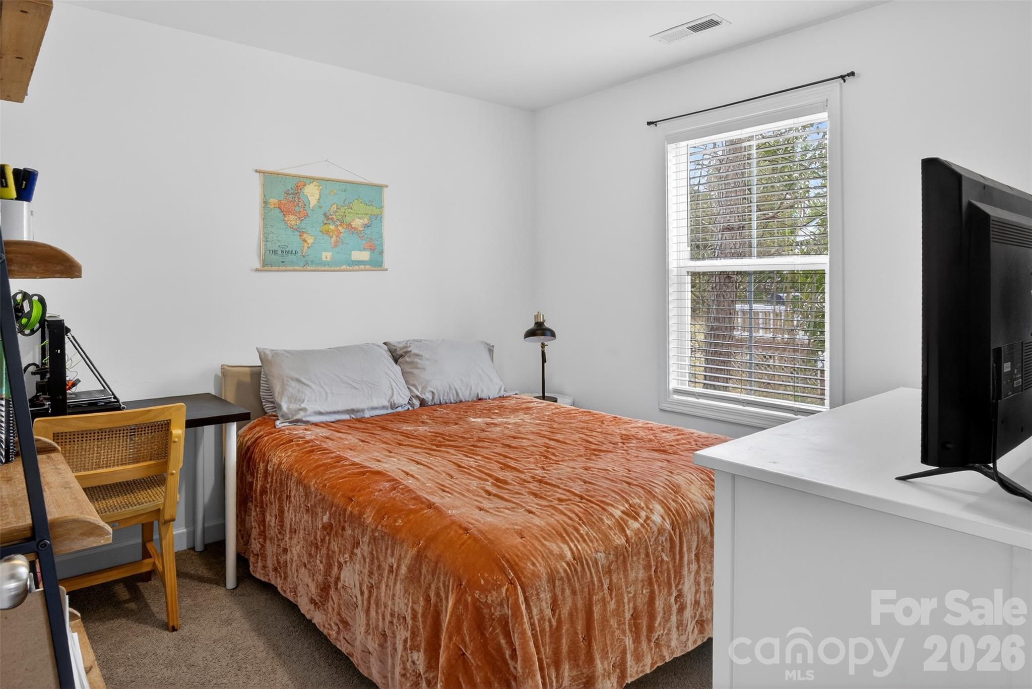 1526 Shepard Street Kannapolis, NC 28083 - Photo 31 of 40 a bedroom with a bed and a flat screen tv