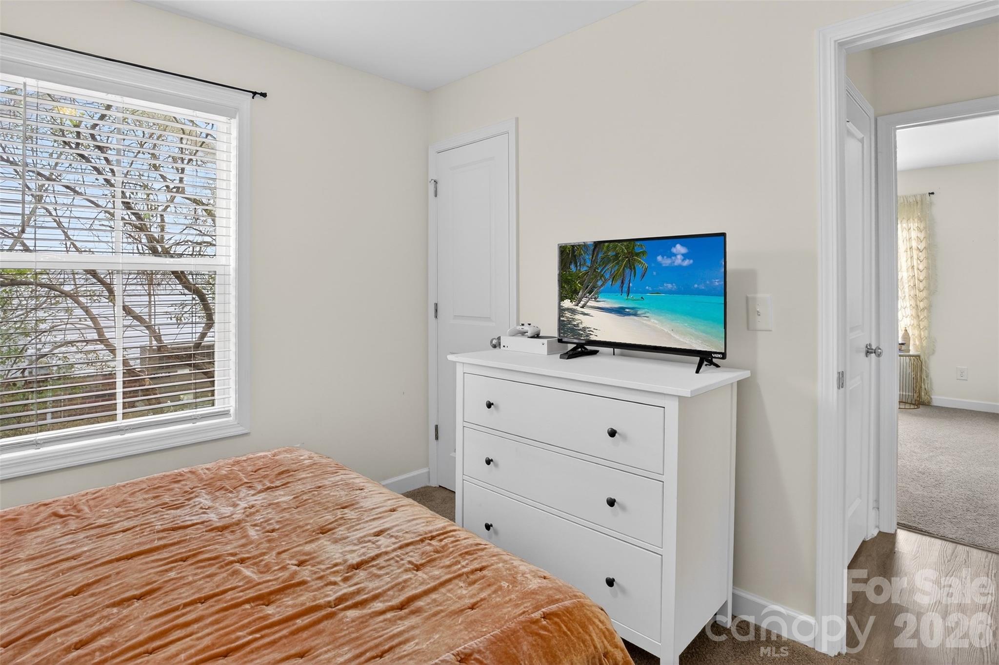 1526 Shepard Street Kannapolis, NC 28083 - Photo 33 of 40 a bedroom with a bed and a flat screen tv