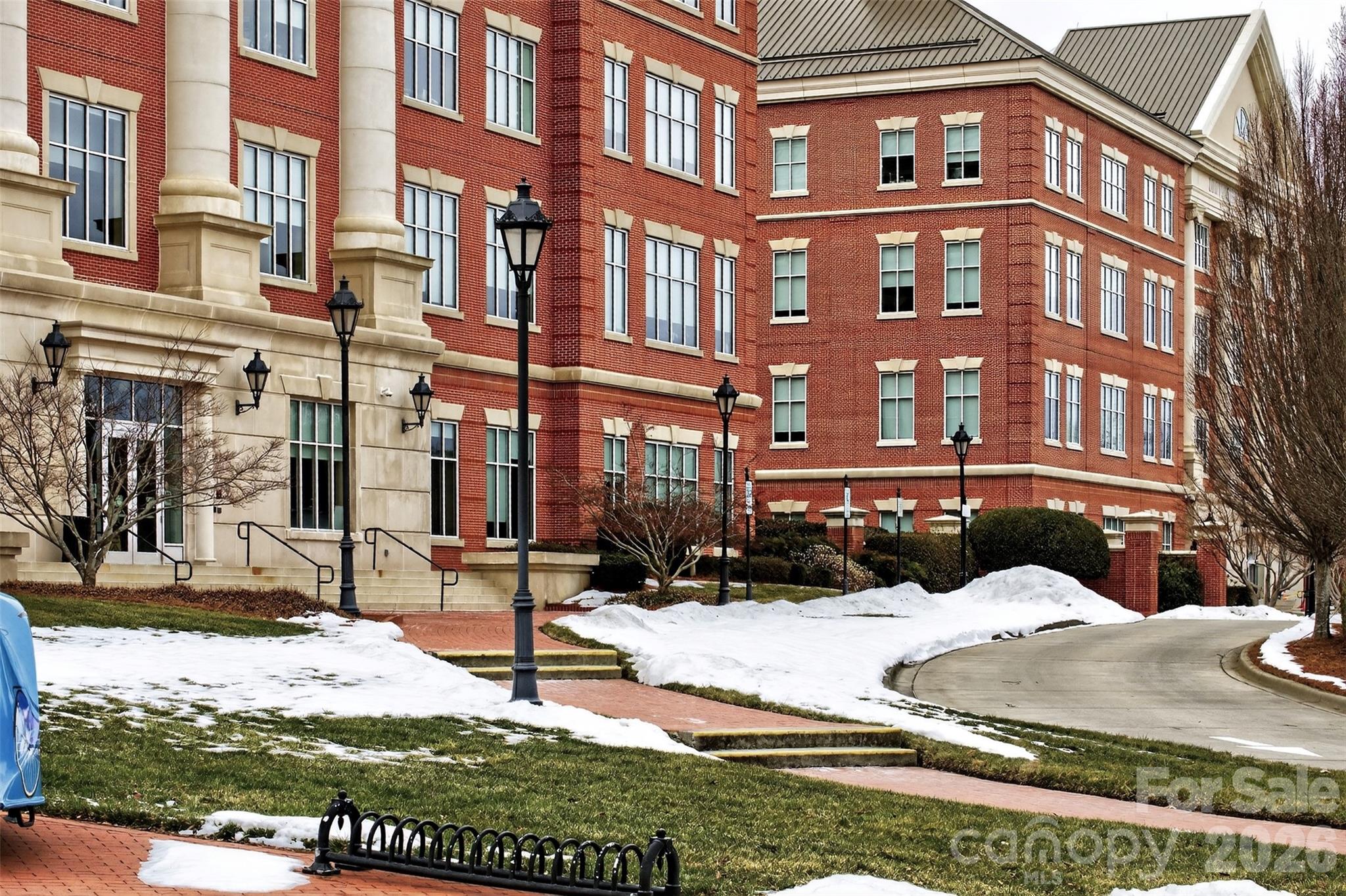 1526 Shepard Street Kannapolis, NC 28083 - Photo 40 of 40 a view of a building with a yard