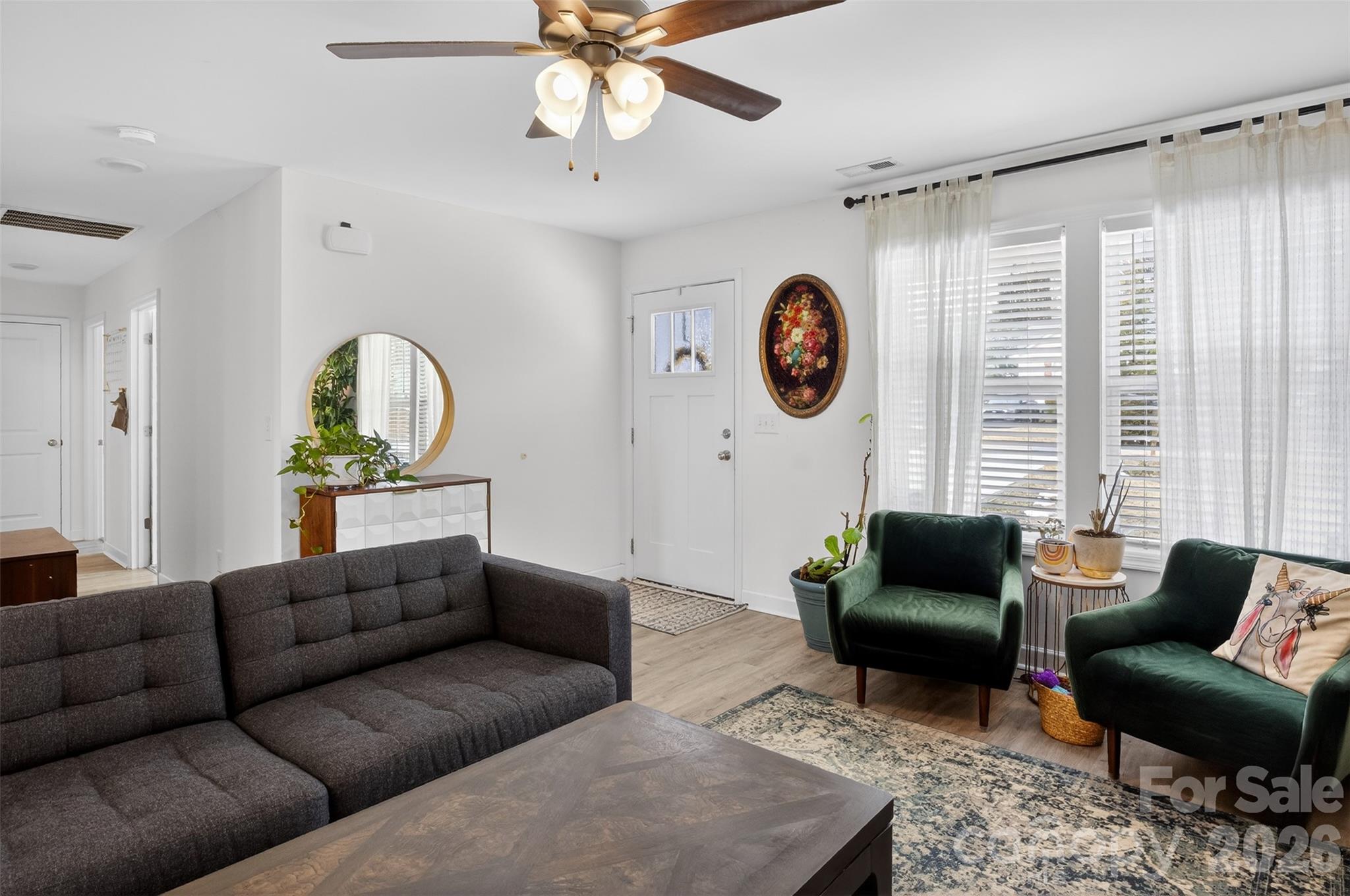 1526 Shepard Street Kannapolis, NC 28083 - Photo 6 of 40 a living room with furniture a rug and a window