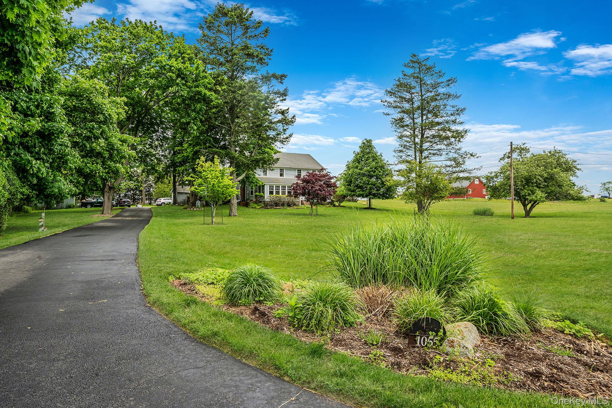 1055 Oregon Road Mattituck, NY 11952 - Photo 3 of 33 Private entry extended driveway