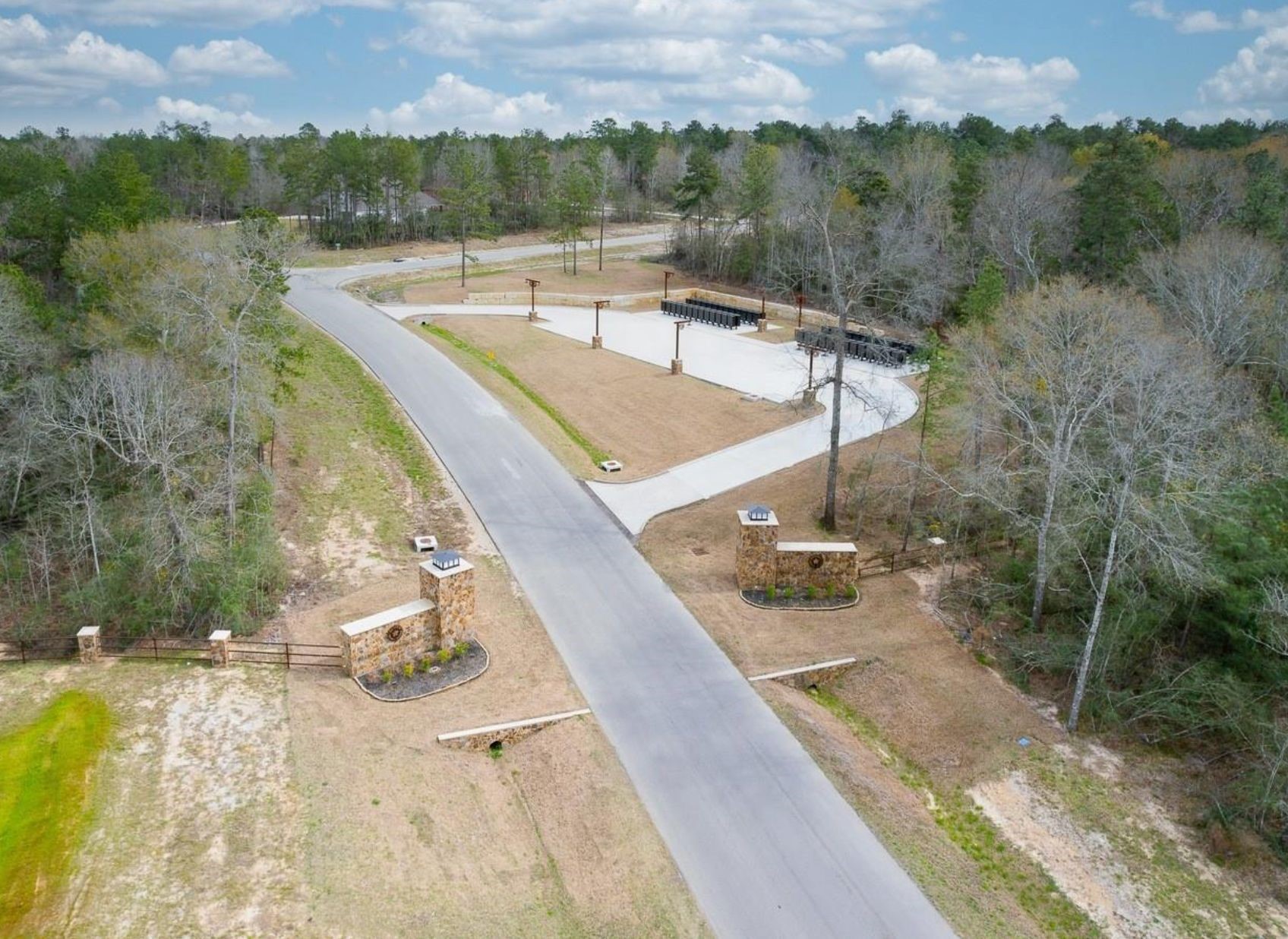 15890 Ridge Oak Road Willis, TX 77378 - Photo 5 of 11 a view of a terrace with a garden and trees