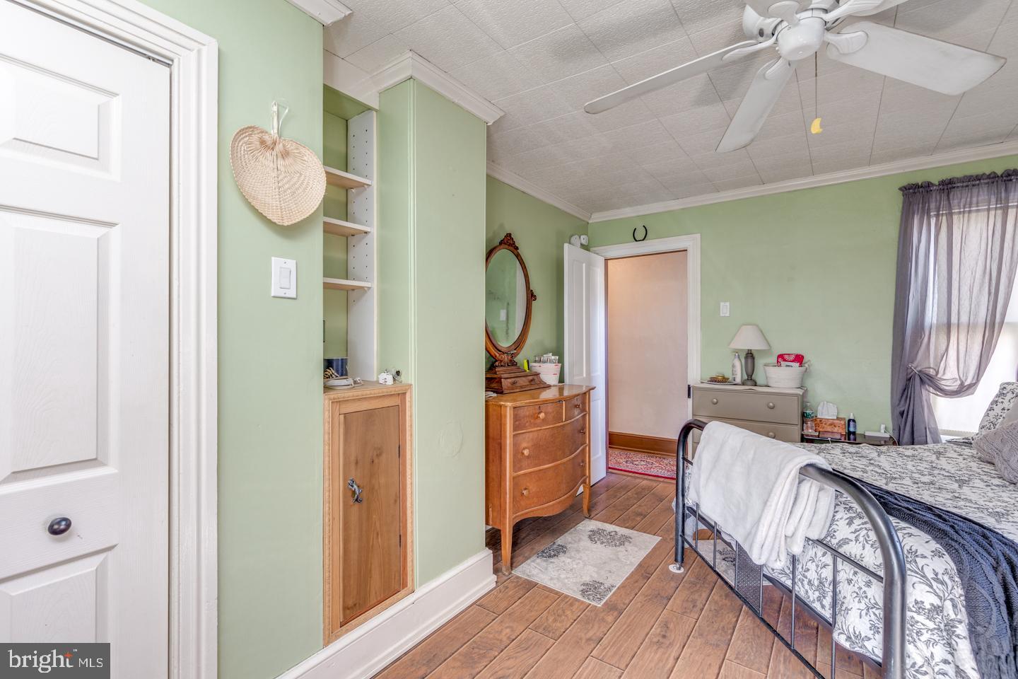 635 Laurel Street Delanco, NJ 08075 - Photo 17 of 45 a bedroom with a bed and wooden floor