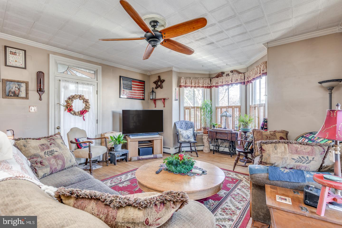 635 Laurel Street Delanco, NJ 08075 - Photo 3 of 45 a living room with furniture and a flat screen tv
