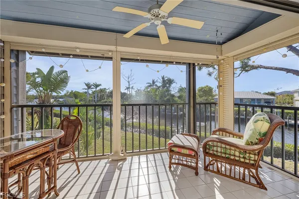 a balcony with furniture