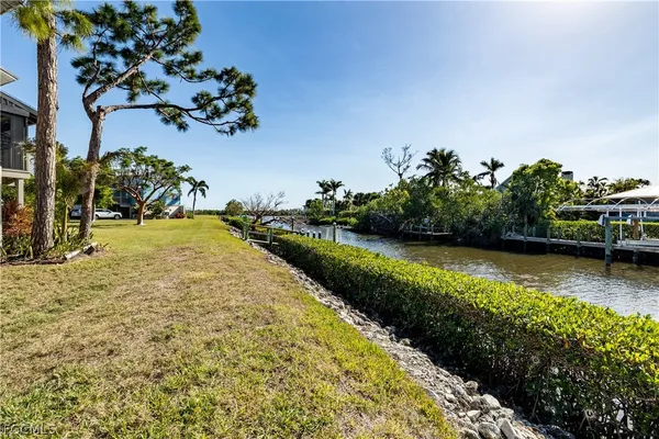 a view of a lake with a house