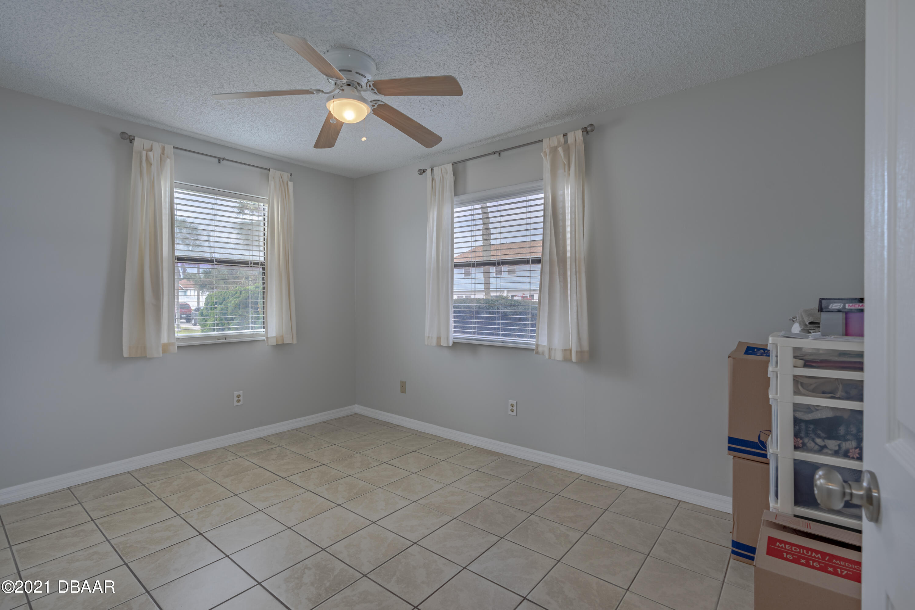 202 Northshore Drive, Unit B Ormond Beach, FL 32176 - Photo 13 of 25 a view of an empty room with a window