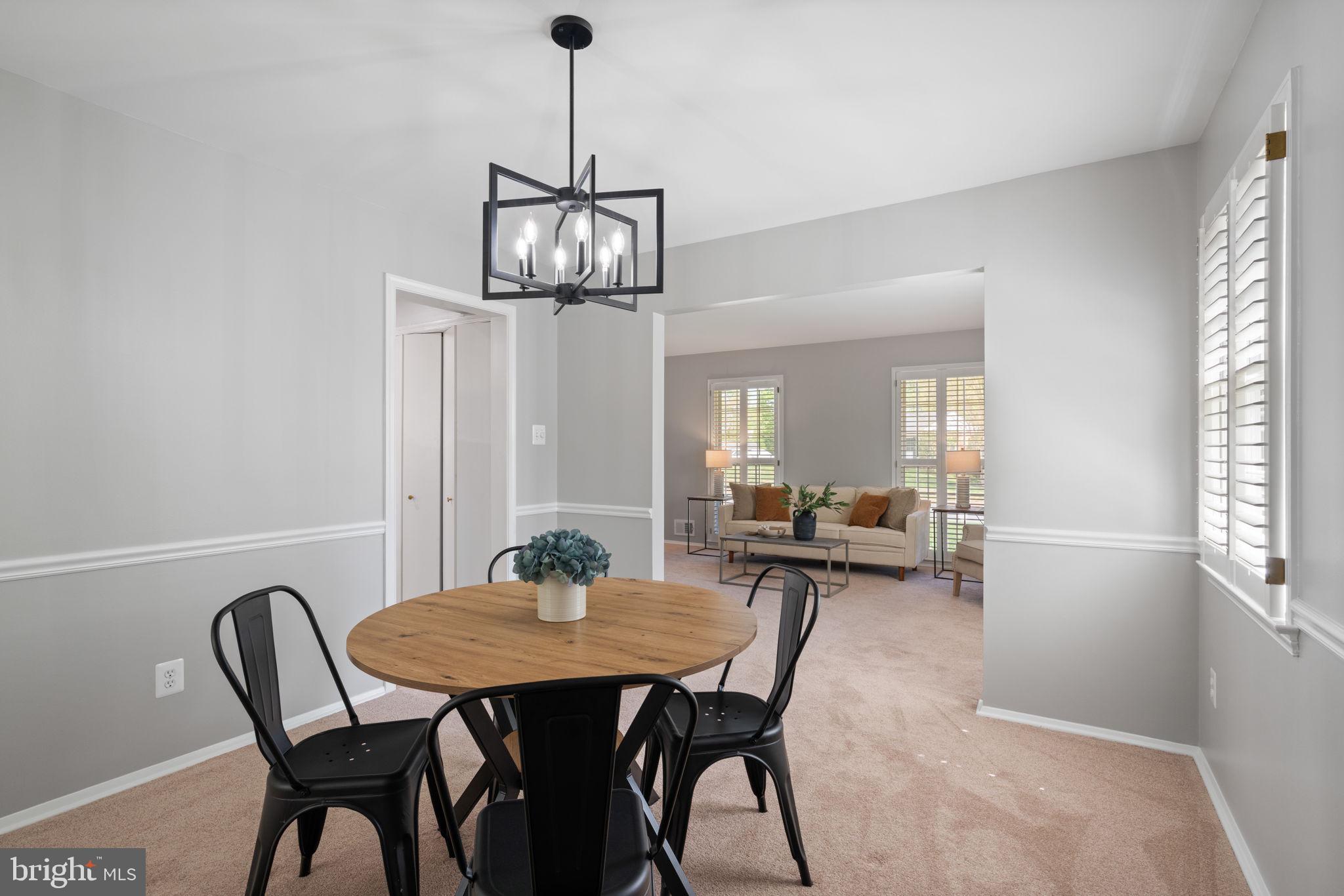 8328 Carrleigh Parkway Springfield, VA 22152 - Photo 21 of 58 a view of a dining room with furniture window and outside view