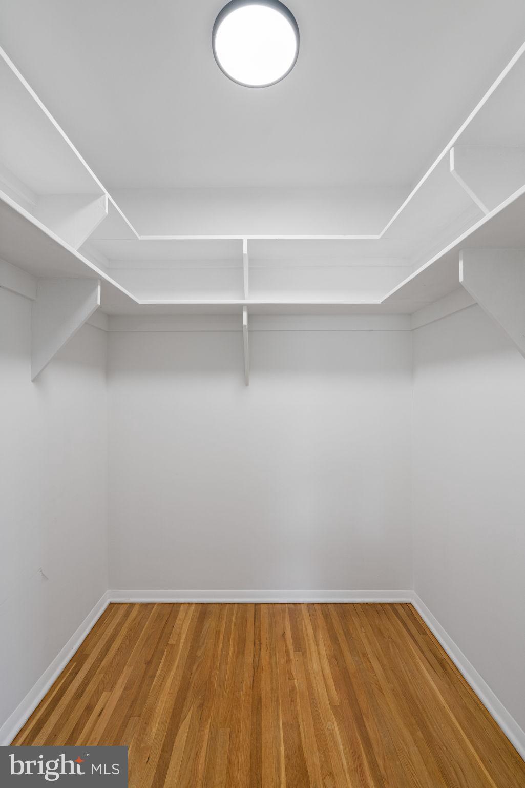 8328 Carrleigh Parkway Springfield, VA 22152 - Photo 25 of 58 a view of a room with wooden floor