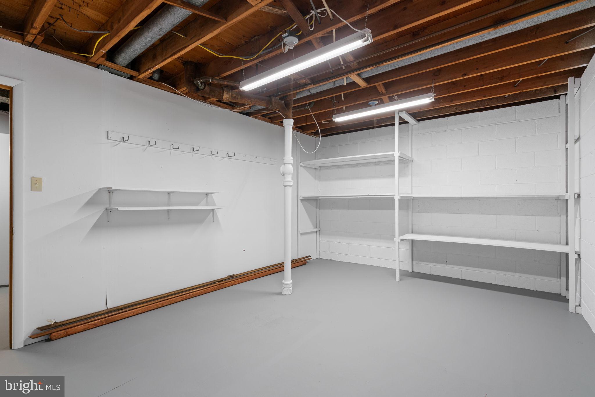8328 Carrleigh Parkway Springfield, VA 22152 - Photo 40 of 58 a view of an empty room with empty racks