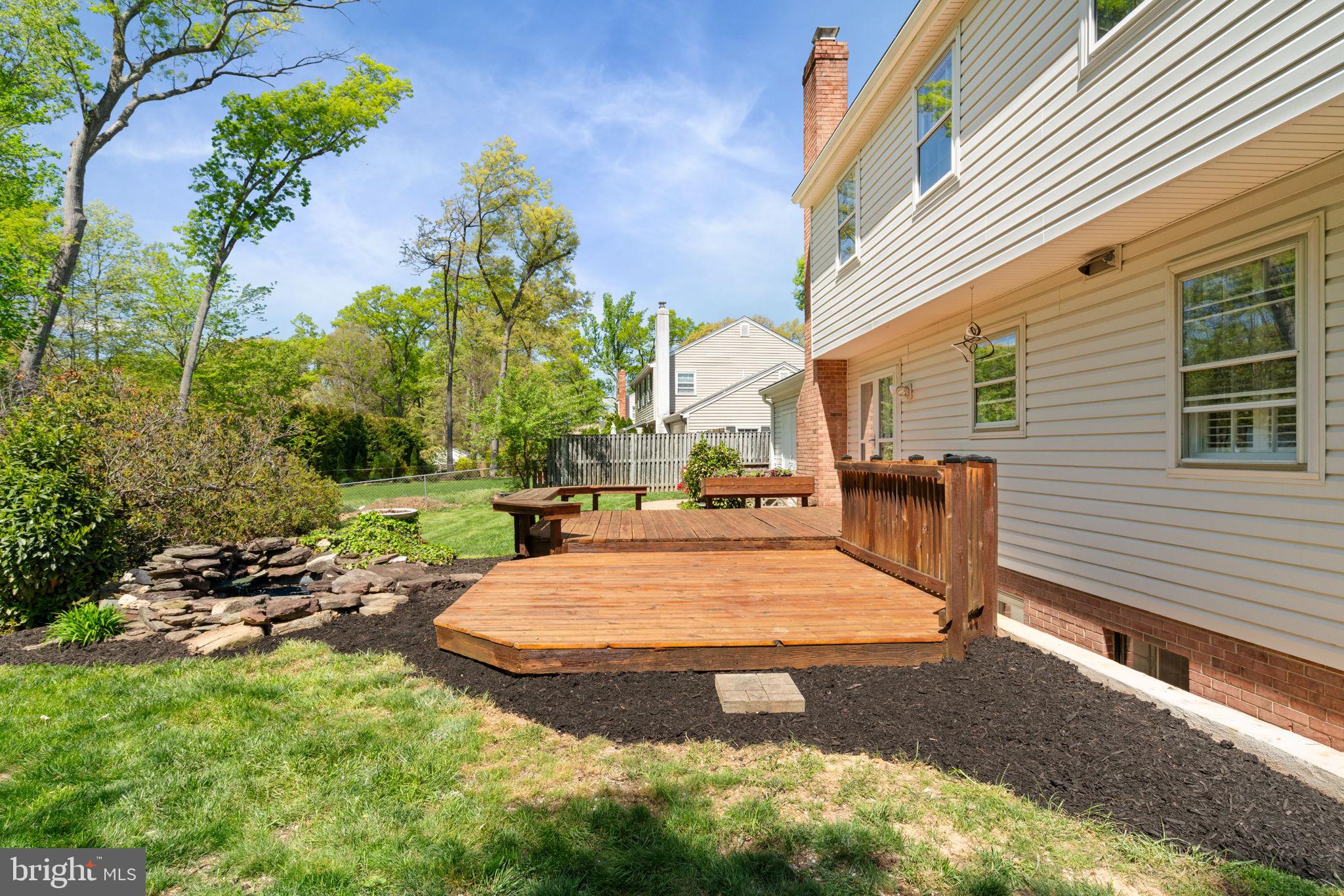 8328 Carrleigh Parkway Springfield, VA 22152 - Photo 46 of 58 a view of a backyard with a patio