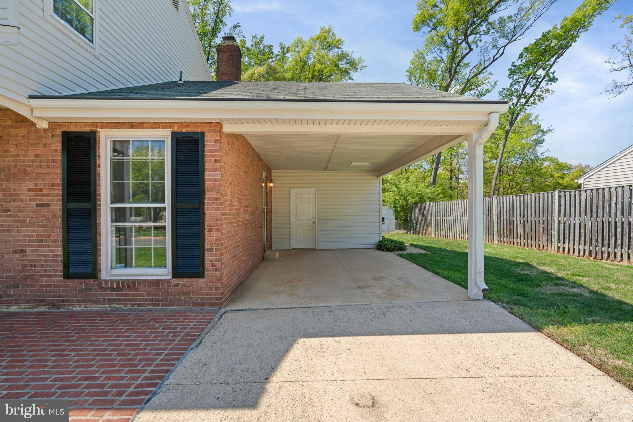 8328 Carrleigh Parkway Springfield, VA 22152 - Photo 5 of 58 a view of entrance gate of a house