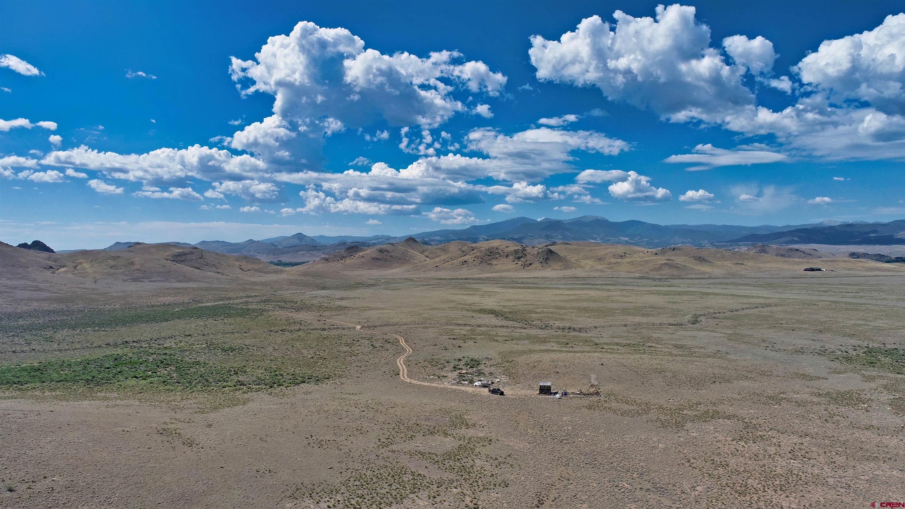 0 Tbd Del Norte, CO 81132 - Photo 5 of 11 a view of a big yard with lots of flower plants