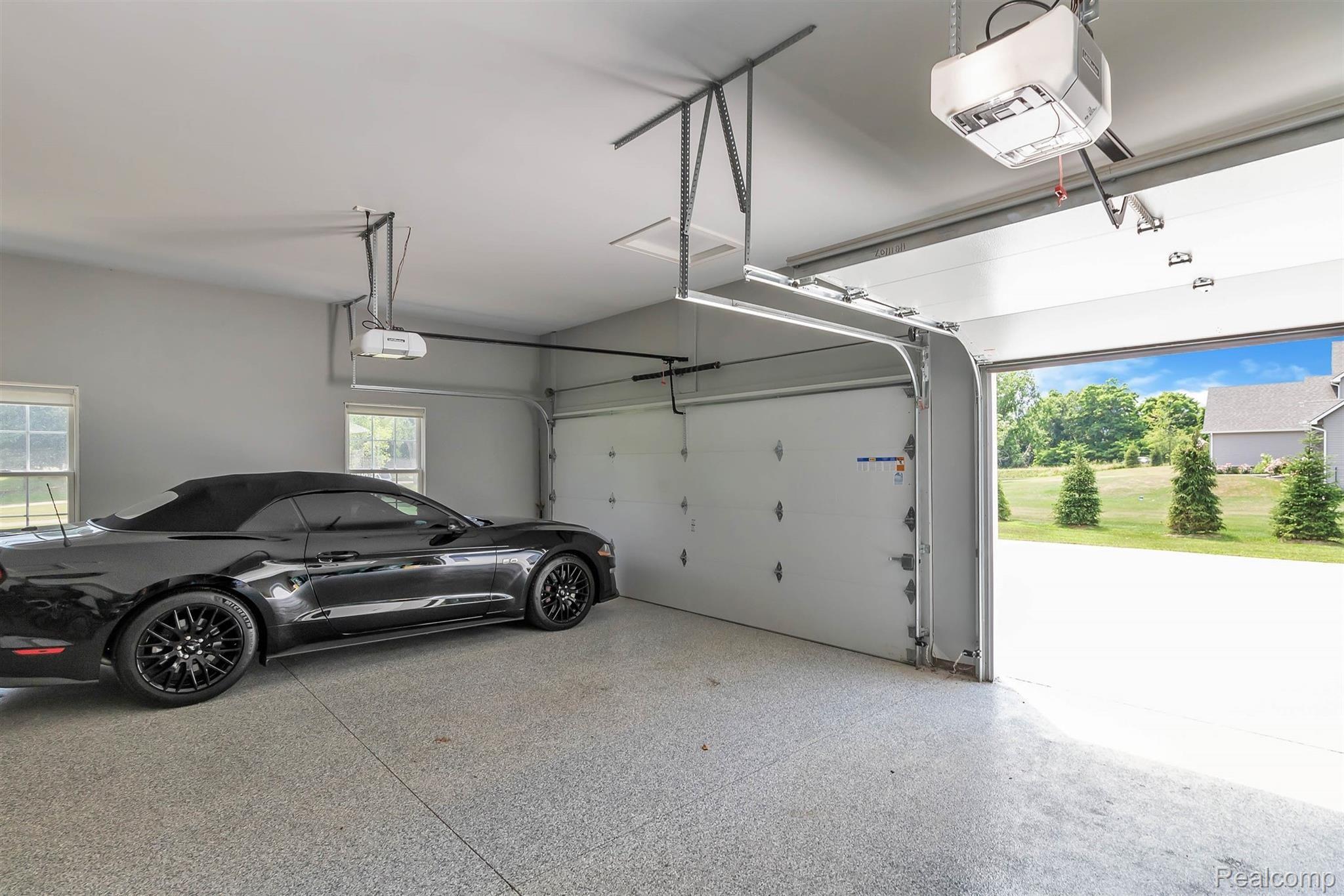 860 North Hacker Road Howell, MI 48843 - Photo 28 of 53 3 Car Attached Garage with Epoxied Floors, Blue Tooth Garage Door Openers