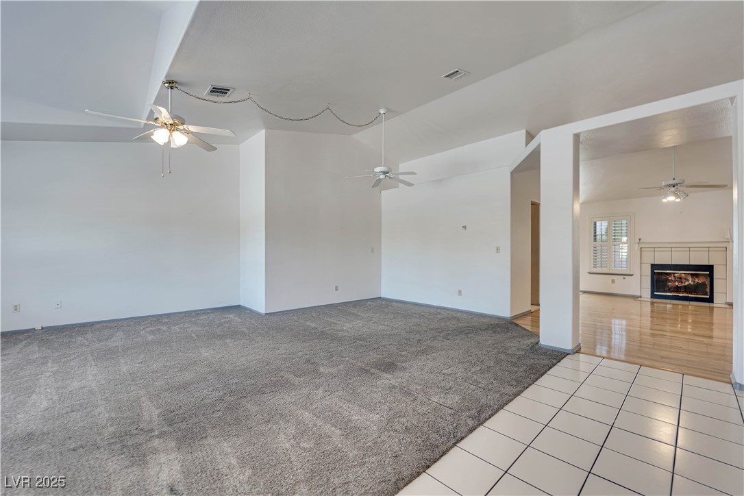 View from front door entry way and living room looking into family room