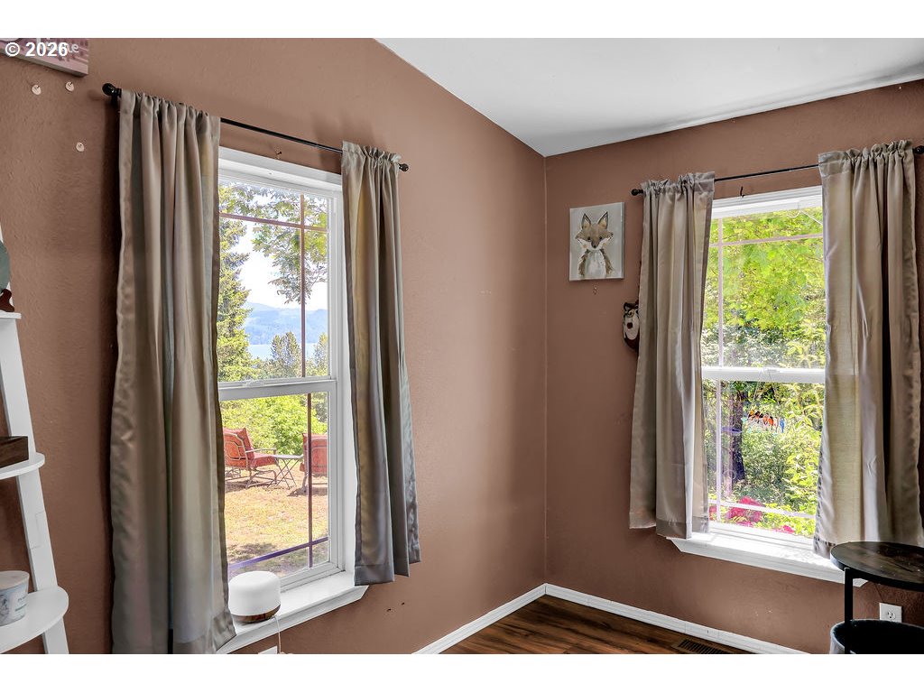 35235 Row River Road Cottage Grove, OR 97424 - Photo 22 of 28 a picture of a window in an empty room