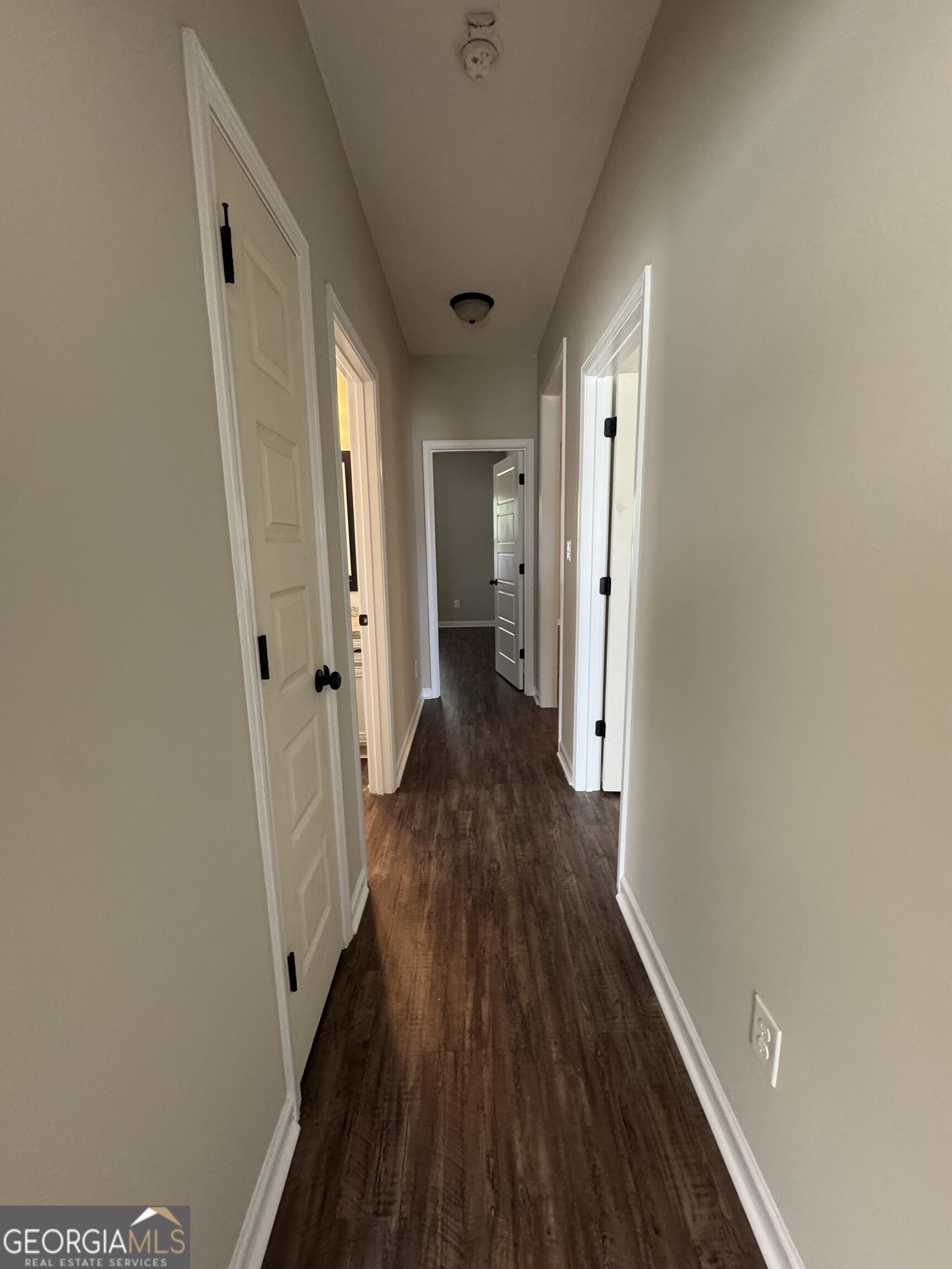 205 Havant Way Perry, GA 31069 - Photo 9 of 9 a view of a hallway with wooden floor
