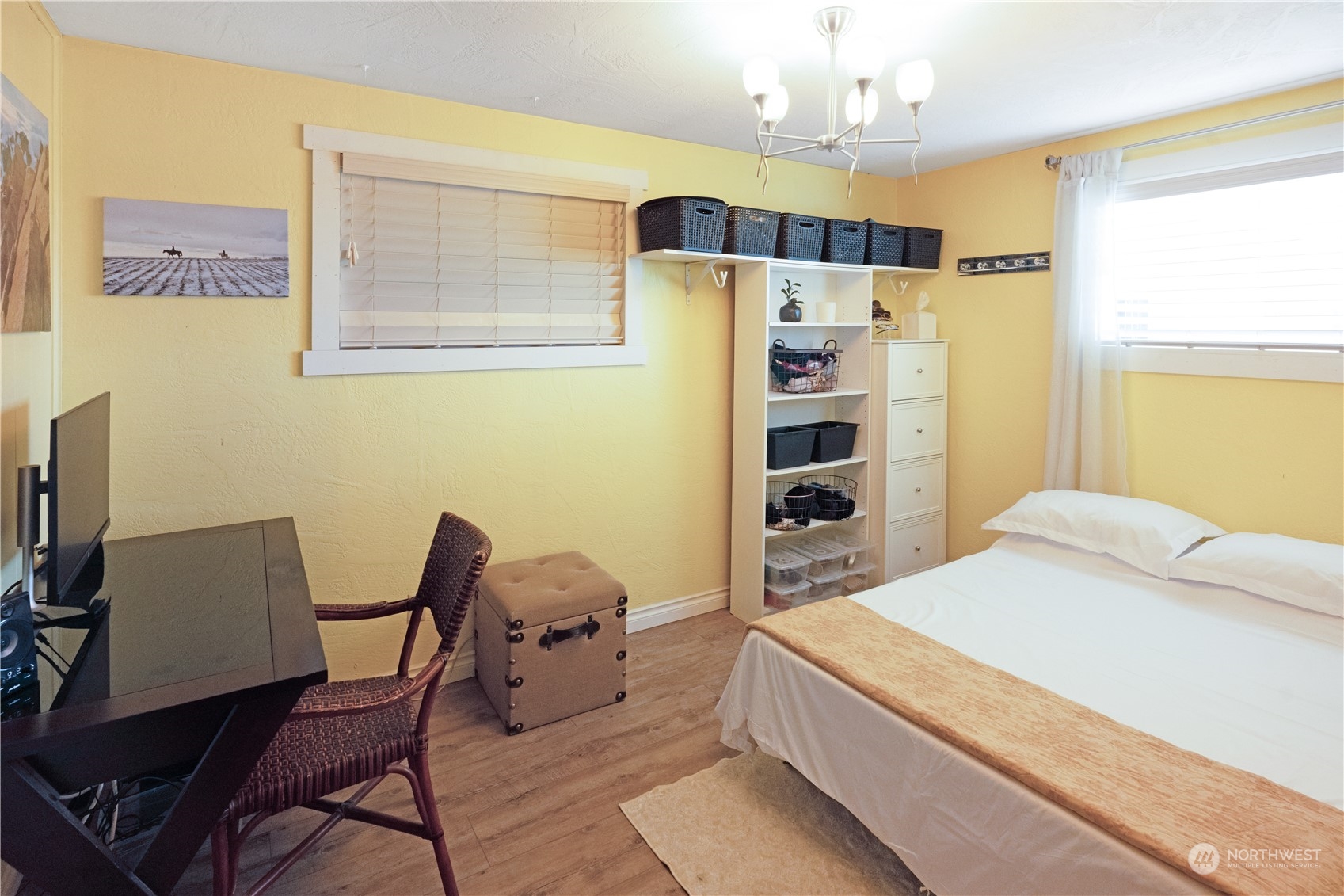 132 Swegle Road Walla Walla, WA 99362 - Photo 16 of 40 a bedroom with a bed dresser and a window